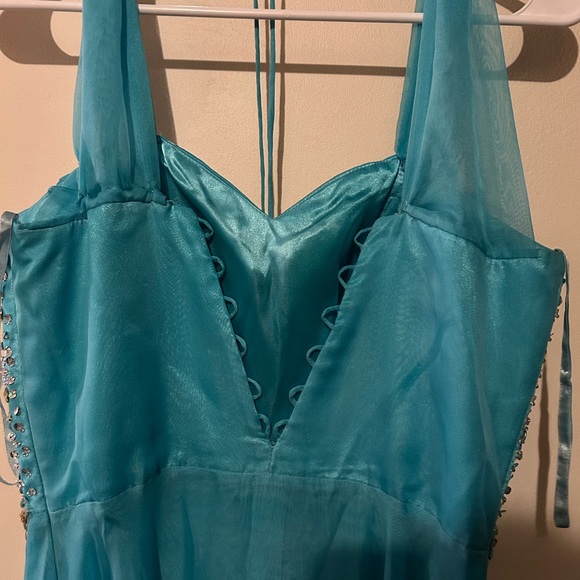 Formal blue dress with sheer cap sleeves by Sally USA in a size medium - Picture 3 of 4